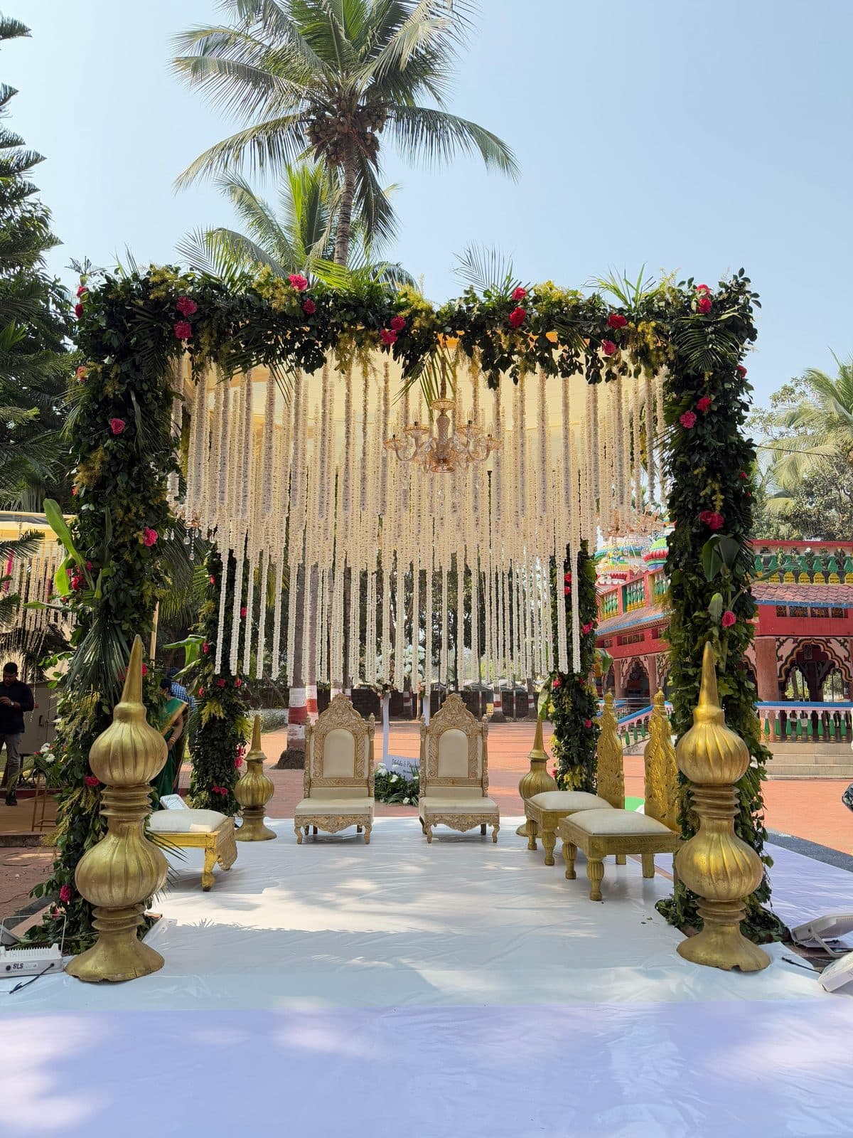 Floral mandap with hanging jasmine strands decorated by East Event